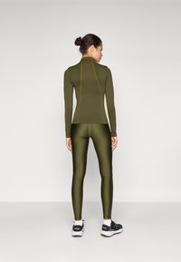Under Armour HEATGEAR - Tajice - expedition green/white