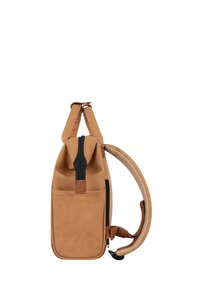 Tan backpack with a smooth, textured fabric, featuring a central zipper, side pocket, and adjustable strap for casual wear.