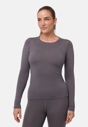 Langarm sporttop in donkergrijs, met een gladde textuur, ronde halslijn en een slim-fit silhouet. Verfraaid met een subtiele stiknaad.
