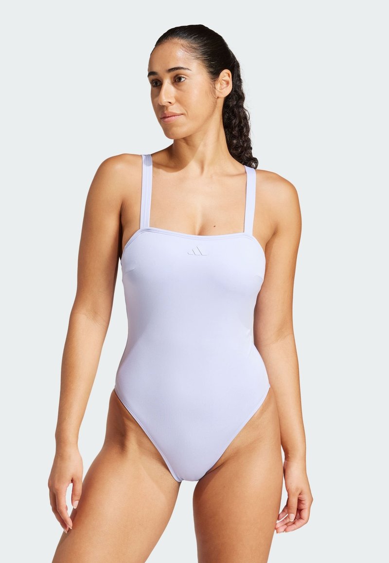 Light purple one-piece swimsuit with a square neckline, thin shoulder straps, and a smooth texture. Features subtle logo on the front.