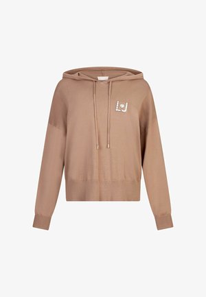 Skrajšana bež kapuca s oblikovalko, rebrastimi manšetami in teksturirano tkanino. Na sprednji strani je majhna bleščeča oznaka.