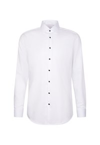 Chemise longue à manches longues blanche avec des boutons noirs, un col pointu et des poignets boutonnés, présentée sur un fond blanc uni.