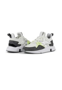 Sneakers featuring a white mesh upper with gray suede accents, neon green details, and a black rubber heel. Bold geometric design.