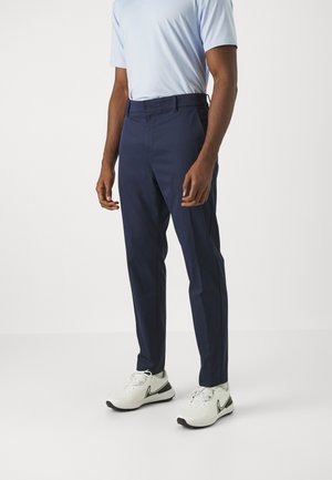 Pantaloni blu navy con design a gamba dritta, realizzati in tessuto leggero con una trame liscia e vita standard.