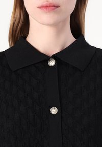 Malina MOA SHIRT - Bluza s gumbima - black