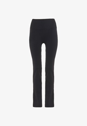 Pantaloni neri a vita alta slim-fit con una cintura larga a coste e gambe dritte, esposti su uno sfondo bianco.