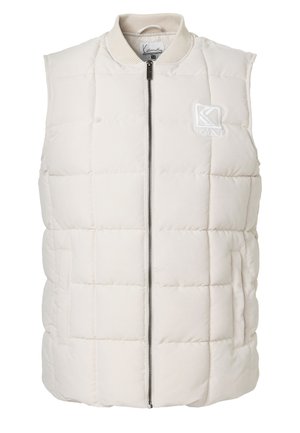 Veste sans manches blanche matelassée avec fermeture éclair à l’avant, col côtelé, deux poches latérales et petit logo brodé sur la poitrine gauche.
