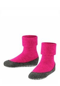 Calzini rosa accoglienti con un bordo a coste, dotati di una suola in feltro grigia e punti di presa testurizzati per una migliore aderenza. Tessuto a maglia morbido in tutto il calzino.