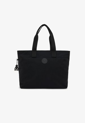Sac fourre-tout noir en nylon doté de poignées doubles, d'un patch logo circulaire et d'un porte-clés décoratif avec une petite figurine.