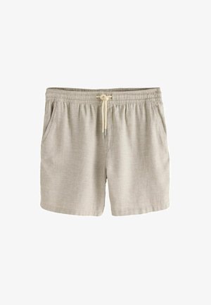 Beežid vabaajashortsid elastse vöörihma ja nöörkinnitusega, millel on küljetaskud ja tekstuurse kangaga disain.