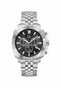 Strieborné hodinky z nehrdzavejúcej ocele s čiernym kruhovým ciferníkom, tromi subciferníkmi a oknom pre dátum. Majú textúrový rámček a prepojený remienok.