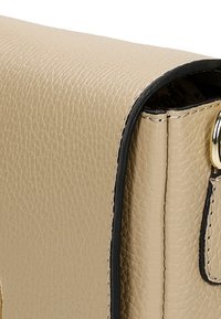 Wojas Taška s příčným popruhem - beżowy