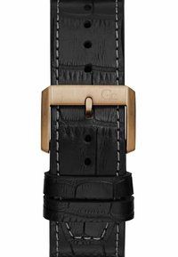 Cinturino in pelle nera con motivo coccodrillo, dotato di fibbia bronzo e cuciture bianche, progettato per eleganza e durata.