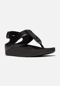 Sandali wedge neri con una fascia testurizzata e un design di perline, realizzati in materiale sintetico, con una soletta imbottita e fibbia regolabile.