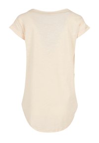 Light beige short-sleeve top with a scoop neck, rounded hem, and soft, lightweight fabric. No visible patterns or accents.