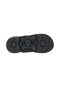 Zwarte sneaker zool met gestructureerd rubber, cirkelpatronen en opvallende profieldetails voor voldoende grip. Laag profiel met gladde randen.