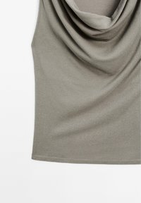 Cowl-neck sleeveless top in soft, muted olive green fabric; smooth texture with draped design and clean hem stitching.