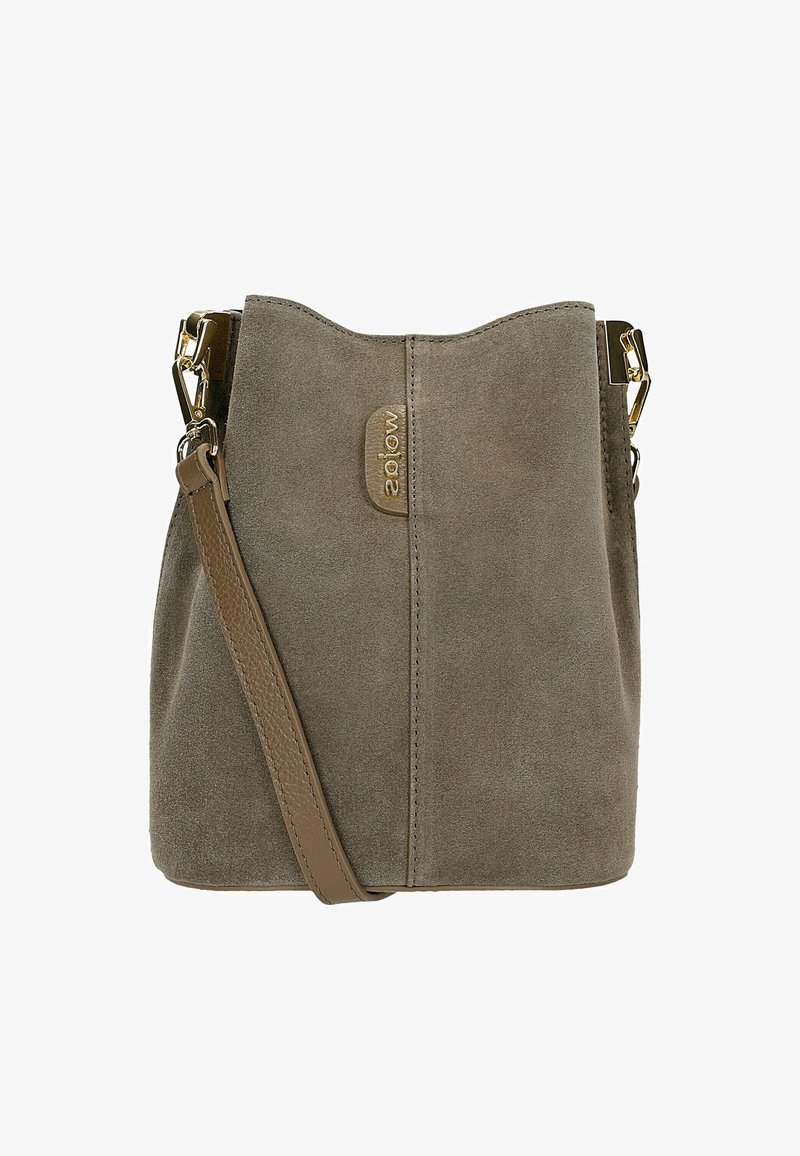 Taupe suede bucket bag with adjustable leather strap and gold-tone hardware, featuring a small leather logo patch on front center.
