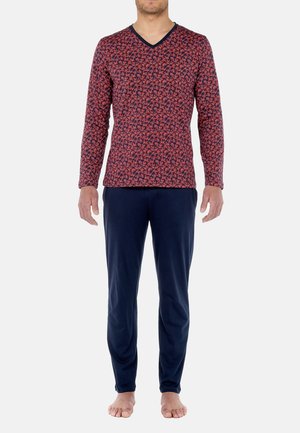 Langærmet V-hals top med et rødt og marineblåt blomstertryk, parret med marineblå bukser med elastisk talje. Blødt stof, afslappet pasform og enkelt design.