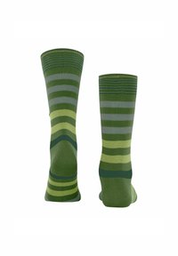 Calze a righe verdi con diverse tonalità di verde e grigio, caratterizzate da un polsino a coste e una texture liscia.