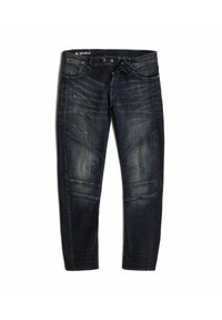 Dark blue denim jeans with a tapered fit, featuring angled seams, whiskering, and subtle distressing on the front.