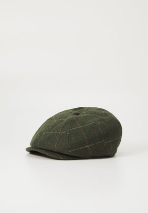 Cappello di lana verde con finitura testurizzata, caratterizzato da un motivo a quadri con linee bianche e arancioni, di forma arrotondata e con una visiera anteriore.