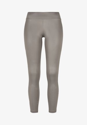 Leggings made of smooth, stretchy fabric in a light gray color. Features a high waistband and a snug fit with no visible seams or patterns.