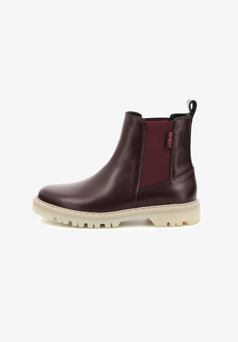 Stivaletti in pelle bordeaux con pannelli laterali elastici e fettuccia di presa. Suola in gomma bianca, resistente, con profondi profili per una migliore aderenza.