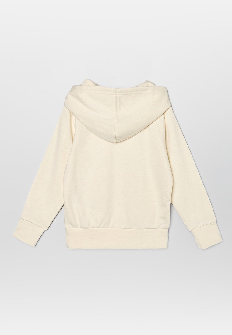 Sudadera color crema hecha de un tejido suave. Cuenta con una capucha grande, puños acanalados y una cinturilla, con una textura lisa y un diseño minimalista.