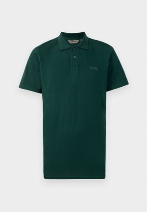 Polo de color verde oscuro, de mangas cortas, con tapeta de dos botones, cuello acanalado y logo sutil en el pecho. Fabricado con una tela de algodón texturizada.