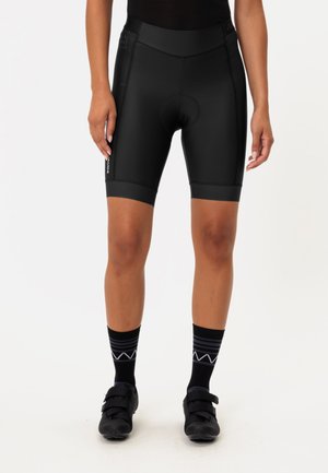 Pantaloni ciclistici neri con un design aderente, realizzati in materiale elasticizzato. Presentano una vita liscia e dettagli cuciti per garantire durata.