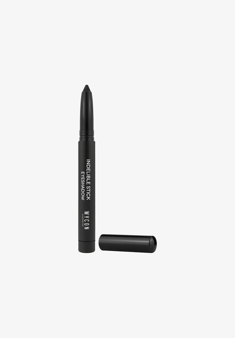 Matita ombretto nera con punta arrotondata. Il packaging presenta un testo bianco che la etichetta come "Indelible Stick Eyeshadow" di Wicon. Il tappo è rimosso.