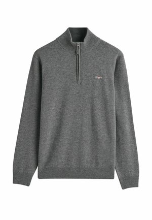 Grijze zip-up trui gemaakt van zacht, gebreid materiaal. Beschikt over een hoge kraag en ribgebreide manchetten en zoom. Klein logo op de borst.