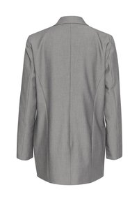 Grå blazer med en strukturerad design, slagkrage, långa ärmar och subtilt texturerat tyg. Har mitt bakseam och inga knäppningar.