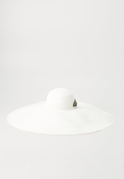 White wide-brimmed sun hat made from woven material, featuring a rounded crown and a textured surface, with a subtle accent at the brim.
