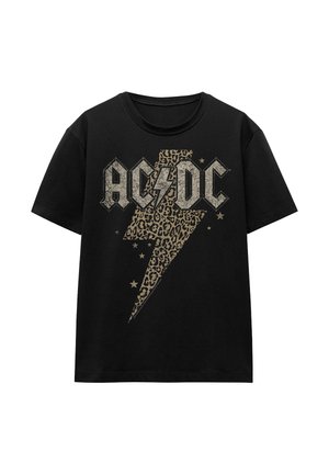 Black cotton t-shirt with short sleeves featuring a leopard print lightning bolt and "AC/DC" text in gold and black.