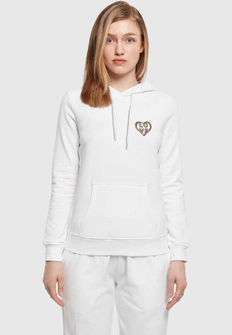 Felpa bianca con cappuccio, caratterizzata da un logo a forma di cuore con stampa leopardata sul petto. Realizzata in cotone con una vestibilità standard. Tasca a marsupio frontale.