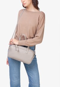 Miriade Skuldertasker - marrone