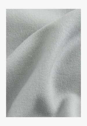 Light gray fabric with a soft, smooth texture and subtle knit pattern, draped to show its flexible and flowy design.