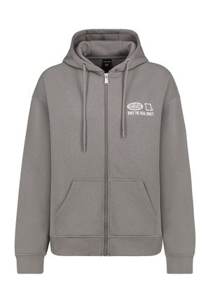 Grey zip-up hoodie with a front pocket, hood, and drawstrings. Features white text reading "EXCLUSIVE ONLY THE REAL ONES" on the left chest.