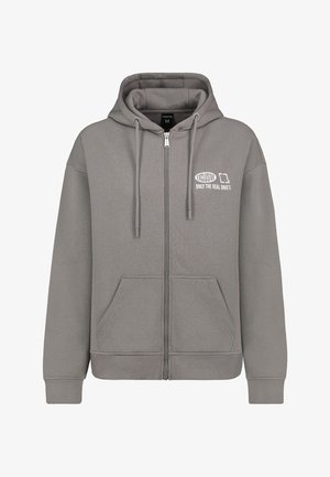 Grey zip-up hoodie with a front pocket, hood, and drawstrings. Features white text reading "EXCLUSIVE ONLY THE REAL ONES" on the left chest.