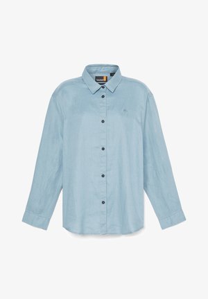 Jasnoniebieska, długotrwała koszula z guzikami w lekkim materiale. Posiada czarne guziki, wywinięty kołnierz oraz małe logo na piersi.