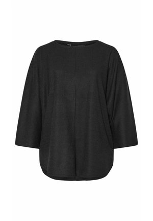 Zwarte oversized top met een ronde halslijn en brede driekwartmouwen. Geribbeld textuur en een gebogen zoom aan de onderranden.