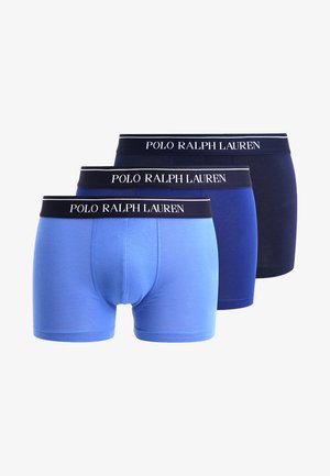 Trois paires de slips pour hommes en bleu clair, bleu foncé et marine, ornés de ceintures élastiques avec le logo "Polo Ralph Lauren".