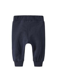 Pantalons de jogging en coton bleu marine avec une taille et des poignets côtelés, présentant une coupe décontractée et une texture lisse. Sans poches ni accents détaillés.