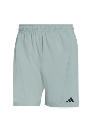 Light grey athletic shorts with an elastic waistband, featuring a black Adidas logo and angled side seams for a modern fit.