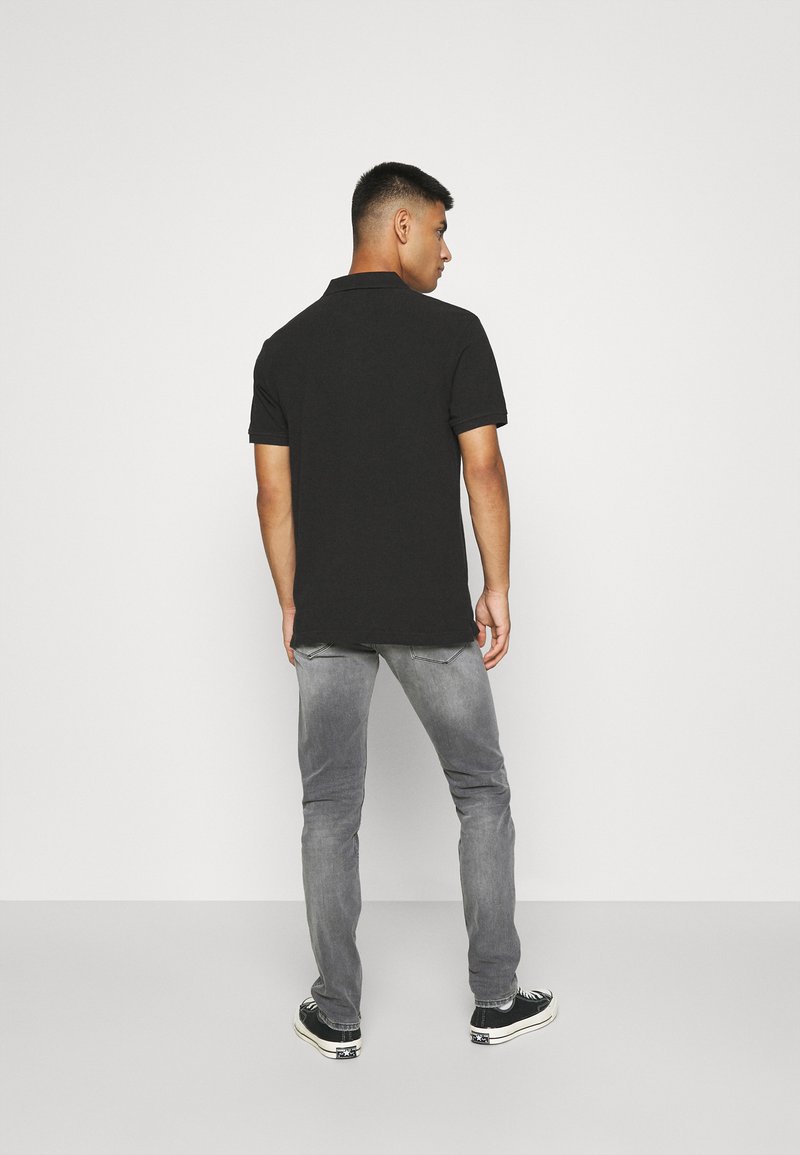 Herren T-Shirts basic | Levi's® Poloshirt mineral black/schwarz - HV11384 Herren T-Shirts basic | Levi's® Poloshirt mineral black/schwarz - HV11384