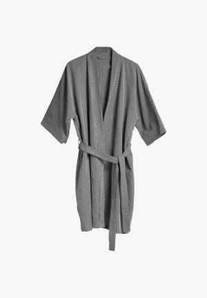 Striped black-and-white robe with short sleeves, a v-neck, and a matching belt. Made of textured fabric, featuring vertical lines throughout.