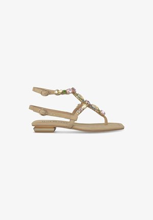 Beige flat sandals with a strap design accented by colorful gems, featuring a low block heel and a smooth textured sole.
