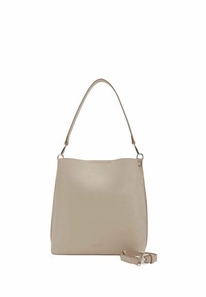 Sac à main en cuir beige avec une poignée supérieure et une bandoulière réglable amovible placée à côté sur un fond blanc.